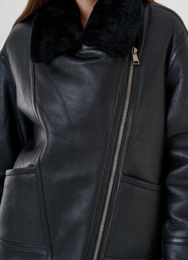 Женская дубленка косуха   модель № 844360 универмаг малина