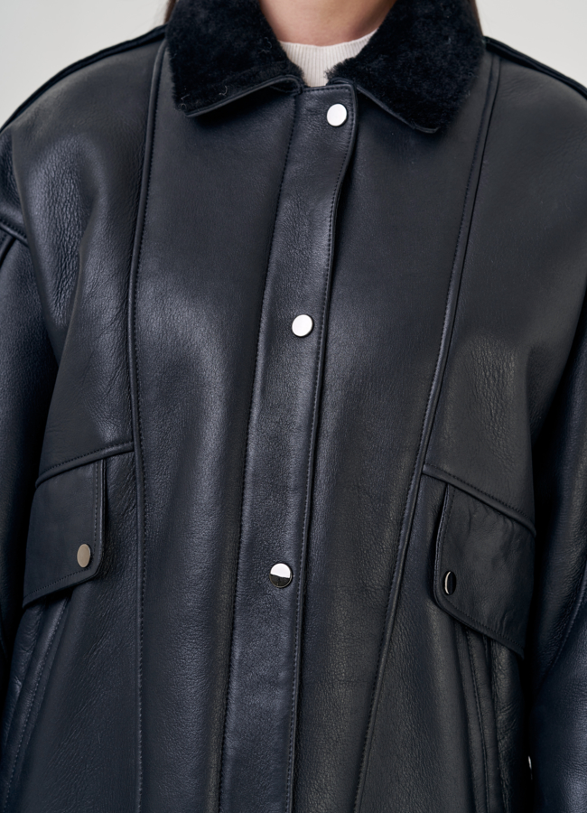 Женская дубленка пилот черного цвета  модель № 22240 универмаг малина