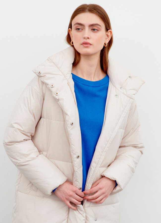 фото Светлый женский пуховик модель № 78915