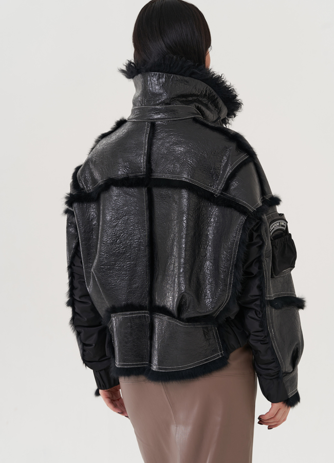 Куртка черного цвета с меховой отделкой  модель № 25748 универмаг малина